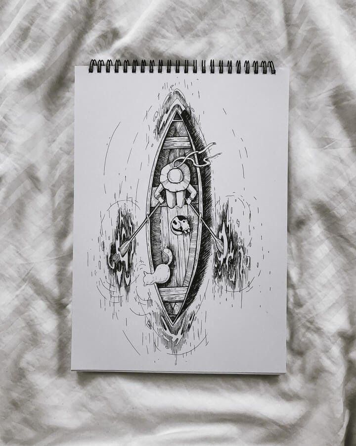 a drawing of a boat on top of a sheet of white paper next to a pen