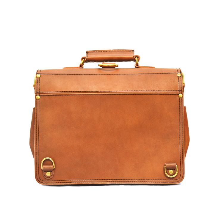 One of our longtime favorites, the Marlondo Leather Wing Briefcase is a unique twist on the classic leather satchel design. The two individually closed front pockets are ideal for storing small items - chargers, earbuds, etc. These two pockets have stud/post closures on top of the straps, allowing you to quickly access your items without having to unbuckle. Open the briefcase's single strap closure and inside you'll find two roomy main compartments, interior organizational pockets, pen slots, an Modern Travel Satchel With Brass Hardware, Modern Satchel With Brass Hardware For Business, Modern Leather Satchel With Brass Hardware, Classic Cases With Leather Lining For Daily Use, Retro Travel Satchel With Brass Hardware, Classic Saddle Bag With Brass Hardware For Everyday Use, Classic Satchel With Brass Hardware For Daily Use, Classic Satchel With Palladium Hardware For Daily Use, Classic Leather Satchel Case