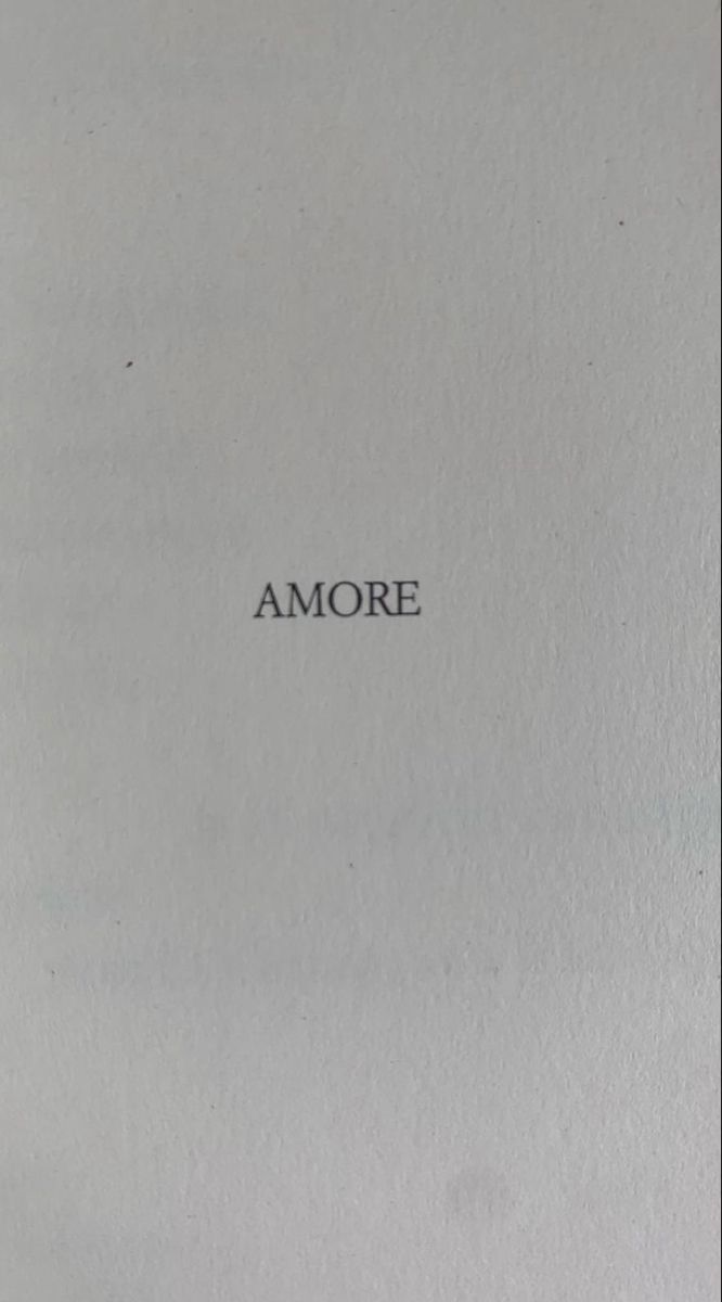 the word amore written in black ink on a white paper