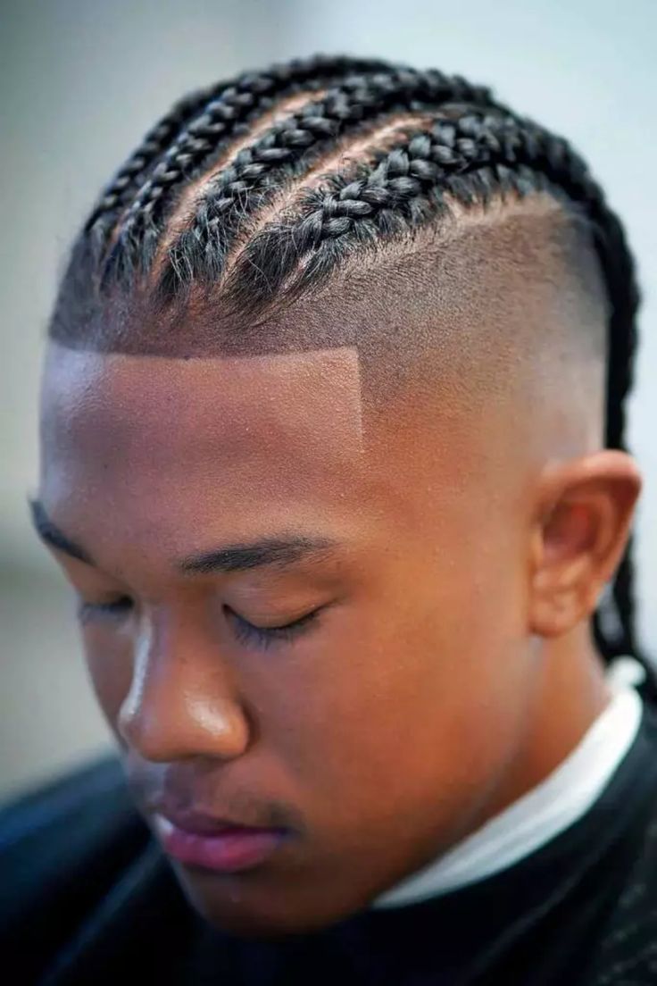 Discover the sleek and modern look of a high fade haircut - a style that adds edge to your appearance. If you're new to this trend, we're here to guide you with expert insights and tips. Explore the versatility and confidence-boosting impact of rocking a high fade cut today! Corn Roll Hair Styles, Cornrows For Boys, Cornrows Men, Cornrow Styles For Men, Black Boy Hairstyles, Braids With Fade, Black Boys Haircuts, Undercut Fade, High Fade Haircut