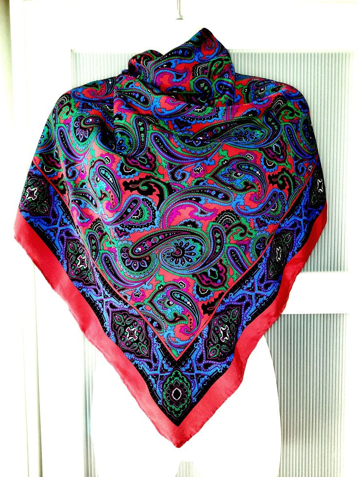 This is an absolutely amazing large square scarf. The scarf is pure silk with handrolled edges. The colors may be slightly different on your computer screen, but generally speaking, the scarf features an awesome paisley design combining burgundy, royal blue and emerald green colors. The colors are darker in real life than on the pictures but the scarf looks rich and gorgeous. The scarf does not have a tag to know the origin of the scarf but it is in excellent condition. The scarf will definitely Elegant Red Square Silk Scarf, Red Rectangular Silk Scarf, Elegant Red Square Scarf, Red Square Silk Scarf For Gifts, Red Square Silk Scarf As Gift, Red Square Silk Scarf For Gift, Multicolor Silk Square Scarf, Red Square Silk Scarf, Vintage Red Silk Scarf For Gift