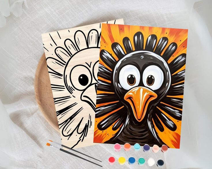 two cards with an image of a turkey and a bird on them next to paintbrushes