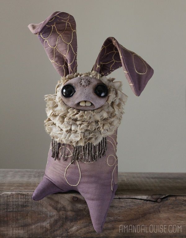 a stuffed animal that has been made to look like it is wearing some kind of clothing