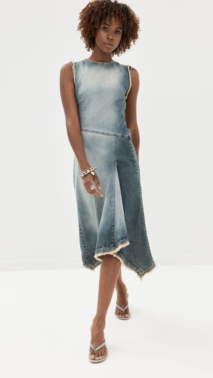 Find ACNE STUDIOS Denim Dress on Editorialist. Fabric: Mid-weight, stretch denim. Contrast stitching. Frayed edges. Asymmetrical hem. Crew neck. Sleeveless. Hook-and-eye and hidden zip at back. Shell: 97% cotton/3% elastane. Unlined. Wash cold. Made in Italy. Measurements: Measurements from size 34 Length: 45.25in / 115.0cm, from shoulder Denim Blue Dress With Frayed Hem, Stretch Denim Blue Denim Dress, Stretch Denim Dress In Denim Blue, Fitted Sleeveless Denim Dress With Frayed Hem, Spring Stretch Denim Midi Dress, Fitted Washed Denim Blue Dress, Fitted Cotton Denim Dress With Frayed Hem, Fitted Denim Blue Cotton Midi Dress, Fitted Denim Midi Dress In Denim Blue