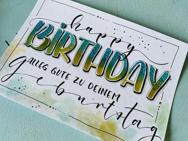 a birthday card with the words happy birthday written in cursive writing on it