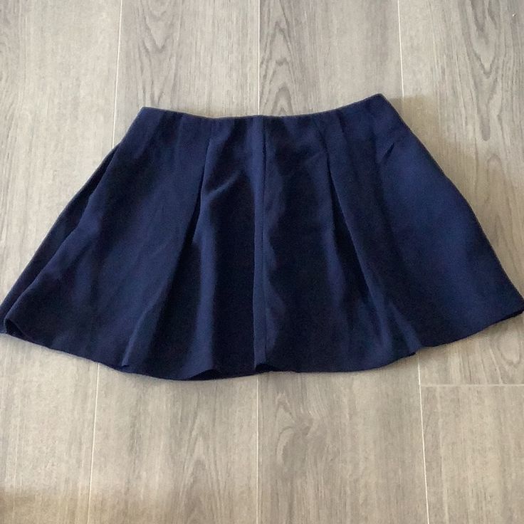 Women Soft Pleated Skirt In 100% Polyester. Lined. Hits Above Knees. Brand New With Tag. In Dark Navy Blue Date Night Pleated Skort, Pleated Mini Skirt For Date Night, Date Night Pleated Stretch Skirt, Date Night Stretch Pleated Skirt, Lined Mini Skirt For Date Night, Date Night Mini Skort With Lined Skirt, Date Night Mini Skirt With Lining, Mini Skirt For Date Night, Flowy Mini Skirt For Date Night