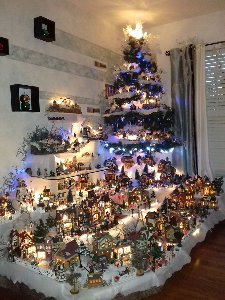 a christmas tree made out of toys and lights