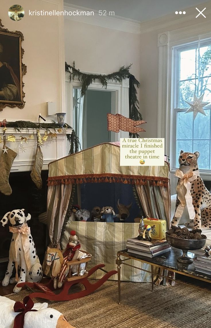 a living room filled with furniture and stuffed animals