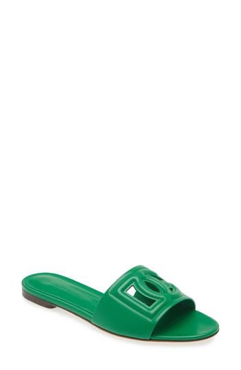 This versatile slide sandal is topped with a dimensional DG logo for added volume. Leather upper, lining and sole Imported Women's Designer Shoes Designer Synthetic Slides Slip-on, Designer Synthetic Slip-on Slides, Luxury Green Open Toe Sandals, Designer Green Open Toe Sandals, Green Flat Slides With Removable Insole, Green Open Toe Slides With Removable Insole, Green Open Toe Mules With Cushioned Footbed, Designer Summer Slides With Cushioned Footbed, Designer Open Toe Slides For Vacation