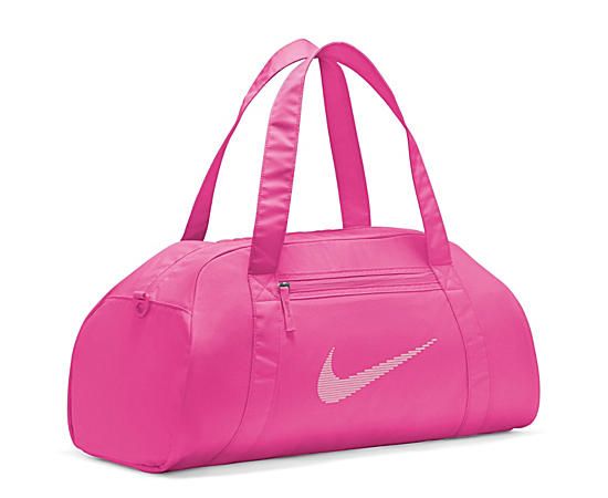 Nike Gym Club Women's Duffle Bag Arrive ready to hit your goals with this grab-n-go essential: Nike Gym Club Duffle Bag. Featuring a 24L capacity, which is enough room to hold Shoe s, clothes or other necessities. There'e a separate front pocket for keys and your phone. Synthetic material Double zip closure Removable shoulder strap Zip front pocket Carry handles Sporty Pink Bag For Sports, Nike Pink Bag For Daily Use, Nike Sporty Bags For Outdoor Activities, Nike Functional Bags For Outdoor Activities, Nike Gym Bag With Zipper Closure, Nike Bags For Outdoor Activities, Nike Functional Outdoor Activity Bag, Sporty Nike Bags For Outdoor Activities, Nike Bags With Zipper Closure For Outdoor Activities