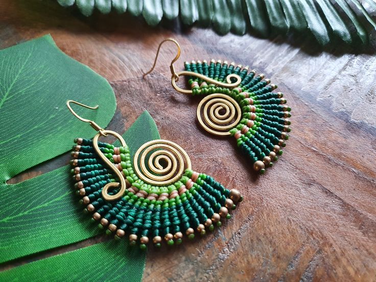 Strikingly bold green macramé earrings, skillfully handwoven round bright gold brass wire, guaranteed to awaken the nature-loving bohemian queen within! For pierced ears, these boho earrings have been lovingly handmade from nickel-free brass wire and waxed cotton which is strong and water-proof. Please do swipe through all the product pictures to get a comprehensive view of the colour and hang of the earrings. Please read the below, in full, prior to purchase. DISPATCH >> Dispatch times ar Handmade Adjustable Green Wrap Earrings, Green Macrame Jewelry For Festivals, Green Macrame Jewelry For Festival, Adjustable Handmade Green Wrap Earrings, Adjustable Green Bohemian Wrap Earrings, Green Bohemian Macrame Earrings, Bohemian Green Macrame Earrings, Bohemian Green Wrap Earrings As Gift, Bohemian Green Wrap Earrings For Gift