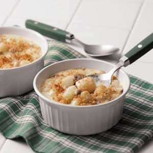 two bowls filled with oatmeal on top of a green and white towel