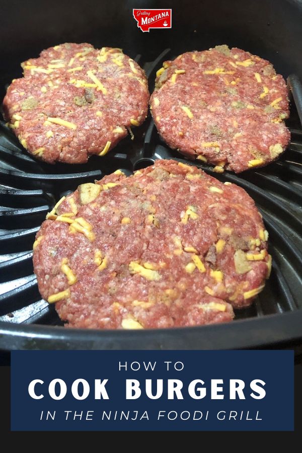 three hamburger patties cooking in an air fryer with text overlay reading how to cook burgers in the ninja food grill