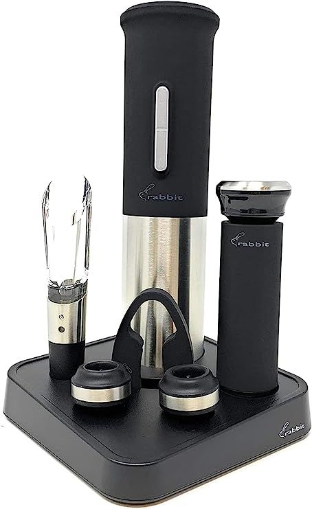 a blender and other kitchen appliances on a stand