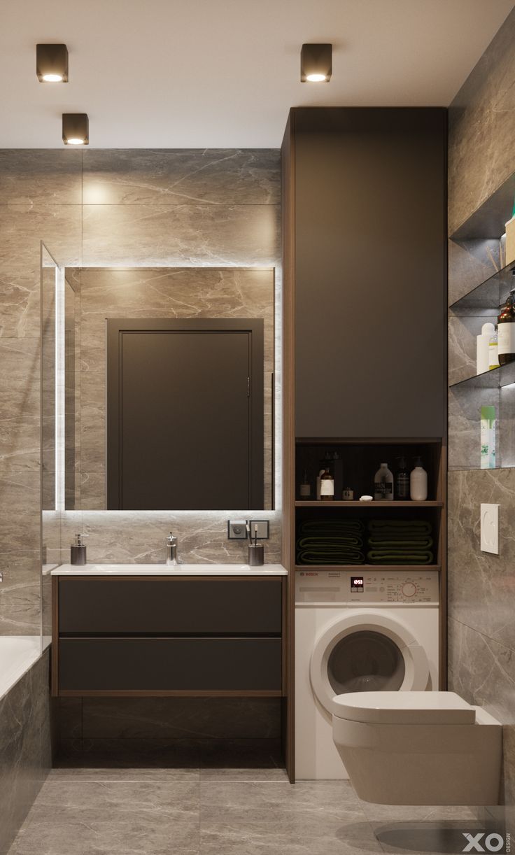 a bathroom with a toilet, sink and bathtub next to a mirror on the wall