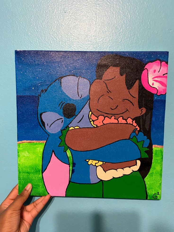 a person holding up a painting of a cartoon character with flowers in their hair and mouth