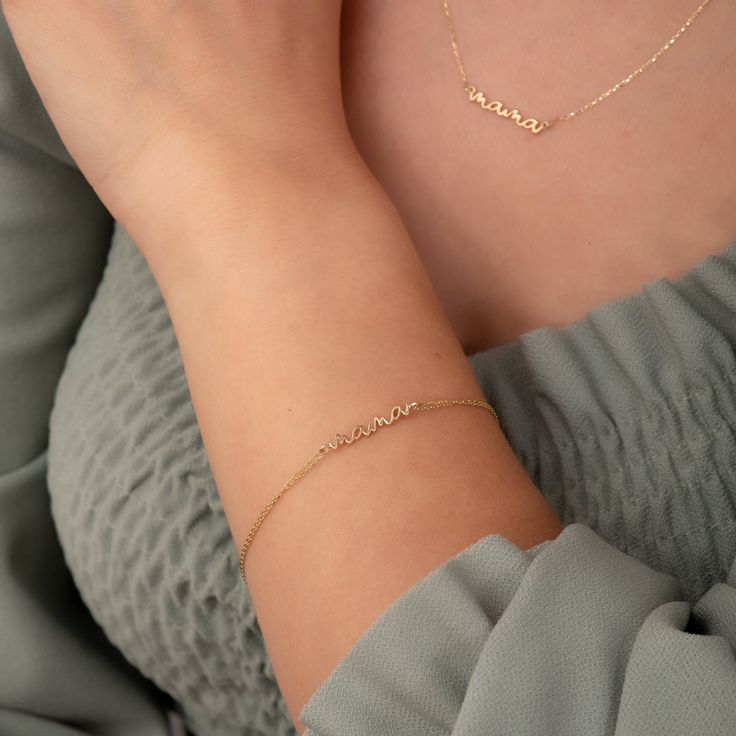 14K 18K Real Gold Dainty Script Mama Bracelet, Delicate Plain Mama Bracelet Gift for Mother's Day, Real Solid Gold Bracelet for New Mom Gift 📘 D E T A I L S * Solid Gold (real gold, no gold-filled or no gold plated material) * Karat: 14K (585), 18K (750) * Gold color: Yellow, rose, and white * Mama Pendant Height: 3 mm * Mama Pendant Width: 1.7 cm Measurements may vary due to handwork. * You can customize the gold color. ┈ B R A C E L E T L E N G T H O P T I O N S * 6.0 inch bracelet (Little Gi Mother's Day Yellow Gold Name Bracelet, Elegant 14k Gold Name Bracelet For Mother's Day, Jubilee Bracelet For Mother's Day, Personalized Diamond Bracelet For Everyday Wear, Minimalist Bracelets As Gift For Mom, 14k Gold Mother's Day Bracelet, 14k Gold Bracelet Jewelry For Mother's Day, Mother's Day 14k Gold Dainty Bracelet, Elegant Everyday Bracelet For Mother's Day