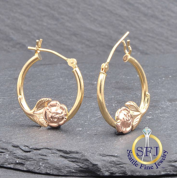 Floral Hoop Earrings, Solid 14k Rose Gold and 14k Yellow Gold *You will receive the exact, one-of-a-kind item pictured.* WHAT SETS SEATTLE FINE JEWELRY APART? + Professional jeweler restored, polished, and cleaned to excellent condition. + All gems graded by GIA Graduate Gemologists. + Professional appraisal certificate included. + Generous 90-day returns & gem authenticity policy. F.A.Q. -- FREQUENTLY ASKED QUESTIONS 1) DO YOU OFFER NO-FEE LAYAWAY PLANS? Yes, we do! Just 20% down, then as many months as you need. Simply contact us to get started. 2) ARE THESE GEMS NATURAL OR LAB CREATED?  Unless otherwise noted, our gems are guaranteed to be natural, earth-mined gems as certified by GIA Graduate Gemologists.  3) ARE THESE GEMS TREATED?  For centuries most colored gemstones have been enhan 14k Yellow Gold Jewelry With Rose Design, 14k Yellow Gold Rose Design Jewelry, Fine Jewelry With Rose Design, Round Rose Jewelry For Anniversary, Rose-colored 14k Gold Round Jewelry, Rose 14k Gold Round Jewelry, Anniversary Jewelry With Roses, Dream Accessories, Floral Hoops