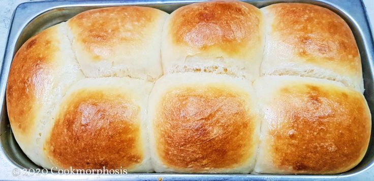 a loaf of bread sitting in a metal pan