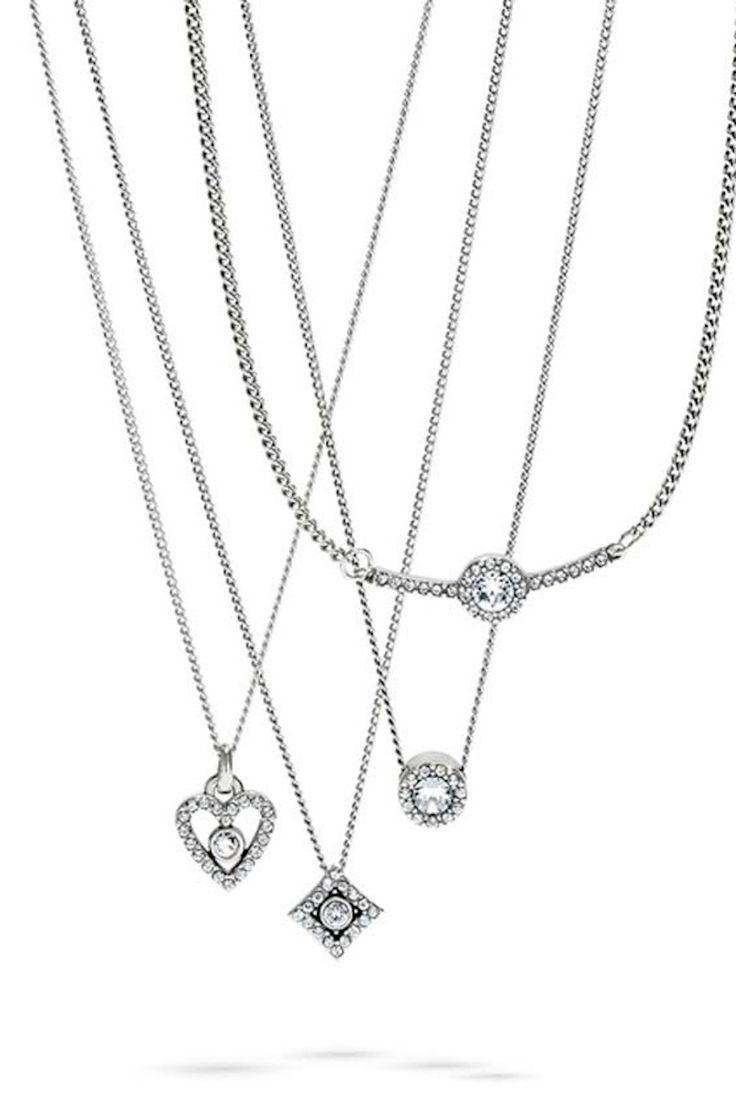 We’ve distilled our Illumina Collection motif down to its essence with a solitaire fine quality crystal and set it into a heart frame for a delicate look you can wear every day. Elegant Sparkling Heart Pendant Jewelry, Elegant Clear Heart-shaped Necklace, Elegant Heart-shaped Clear Necklace, Elegant Clear Heart Shaped Necklace, Elegant Sparkling Heart Cut Jewelry, Elegant Clear Necklaces For Valentine's Day, Elegant Clear Necklace For Valentine's Day, Elegant Clear Jewelry For Valentine's Day, Elegant Everyday Crystal Jewelry