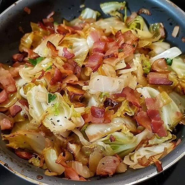 a pan filled with lots of food on top of a stove