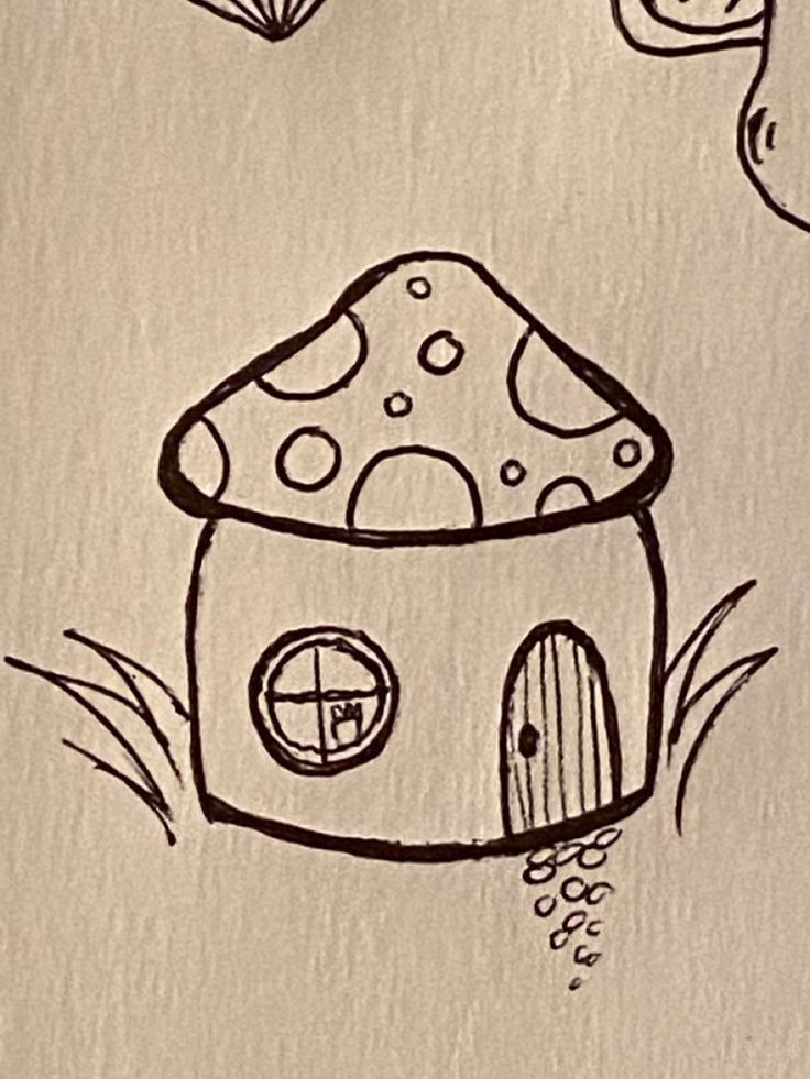 a drawing of a mushroom house in the grass