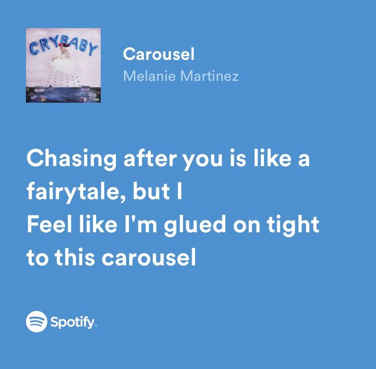 a blue background with the words chasing after you is like a fairy tale, but i feel like i'm glued on tight to this carousel