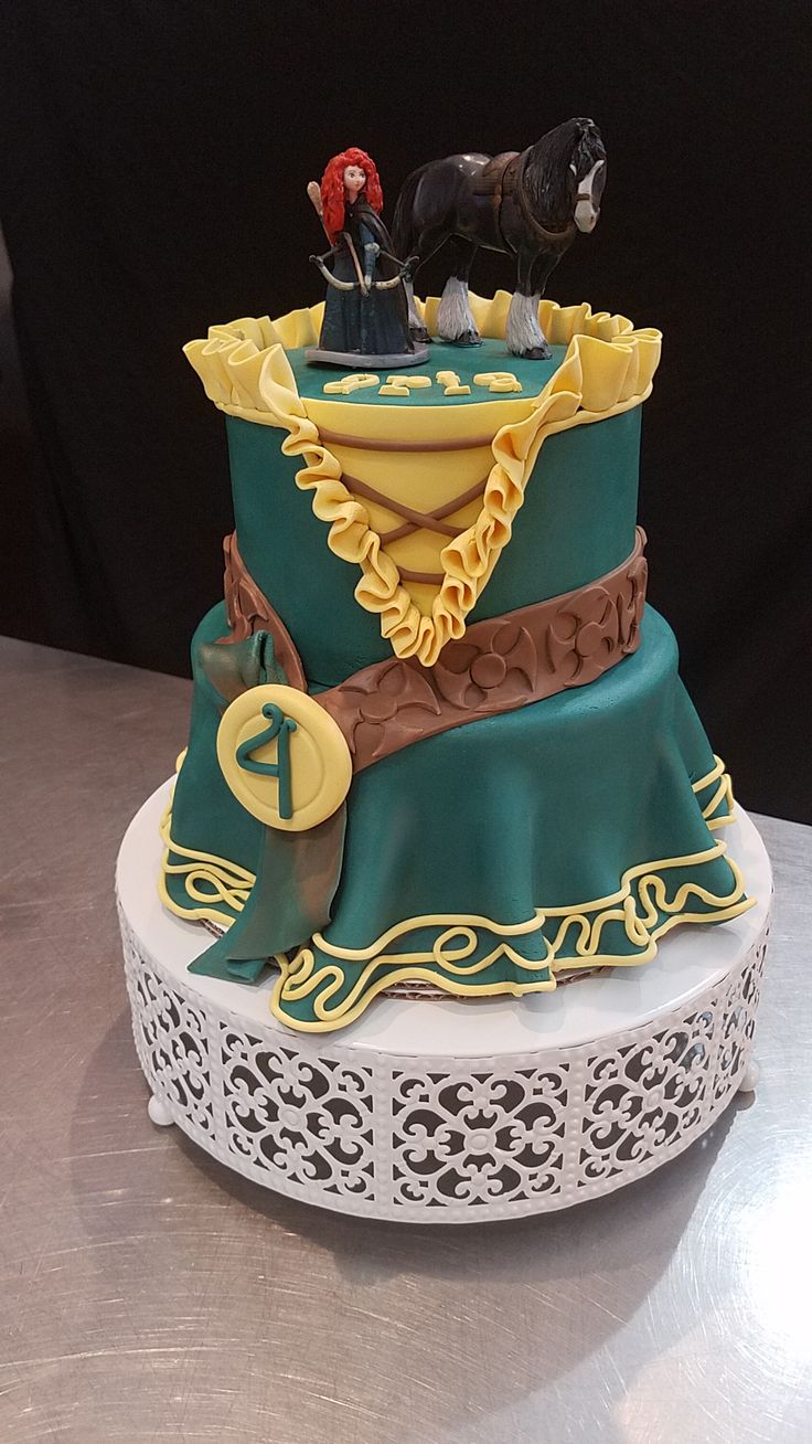 a cake with a horse and rider on top