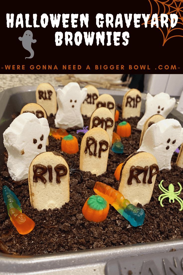 halloween graveyard brownies with fake tombstones and ghost heads in the dirt on top