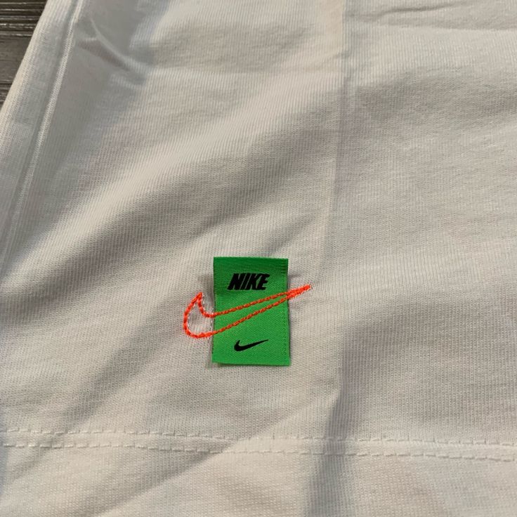 Nike Shirt That Gives Off White Vibes Mew With Tags White Sporty T-shirt With Branding, White Cotton Graphic Tee, White Long Sleeve T-shirt With Branding, Nike Cotton Tops Relaxed Fit, White Cotton T-shirt With Logo Print, Nike Cotton Top, Nike Cotton Tops With Branding, White Cotton Casual T-shirt, Nike White Tops For Summer