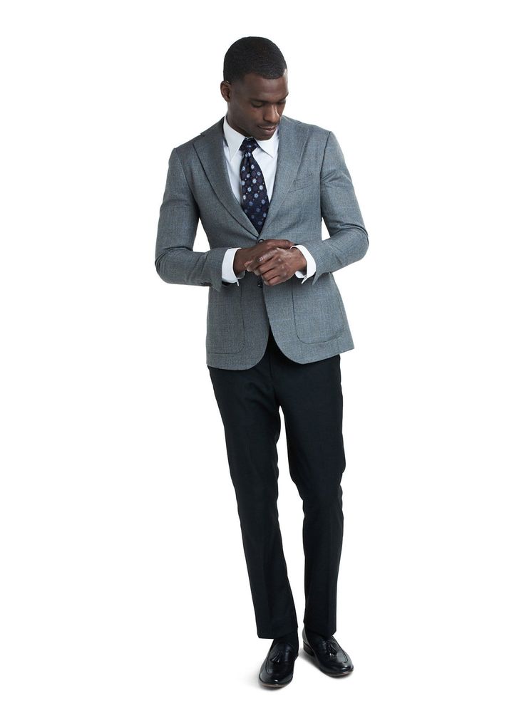 A casual but sharp piece, this grey Saint Tropez is perfect if you’re looking for a laid-back feel, while still being the prince of the party. Its ‘fitted in all the right places’ structure, patch pockets, wide notched lapels, and windowpane pattern, keeps you comfy and collected so you can continue to be the natural gem that you are. Formal Gray Suit With Pockets, Dapper Tailored Blazer For Workwear, Gray Blazer With Pressed Crease For Office, Gray Office Blazer With Pressed Crease, Fitted Suits With Patch Pockets For Office, Gray Blazer With Pressed Crease For Work, Gray Workwear Blazer With Pressed Crease, Dapper Notch Lapel Blazer For Business Casual, Fitted Suits With Patch Pockets For Business Casual