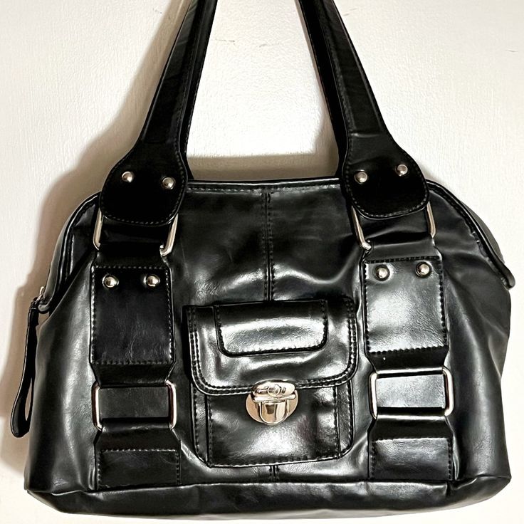 This Black Bag With Buckles And Studs Is The Perfect Size And Very Light To Carry. It's Vegan And Roomy And Super Soft! Nwot Black Shoulder Bag With Hasp Closure For Everyday, Black Satchel Tote With Hasp Closure, Everyday Black Shoulder Bag With Hasp Closure, Casual Black Satchel With Hasp Closure, Black Hobo Bag With Metal Hardware, Black Hobo Bag With Metal Hardware For Everyday Use, Black Satchel With Metal Hardware For Shopping, Black Satchel With Hasp Closure For Shopping, Black Shoulder Bag With Hasp Closure And Double Handle