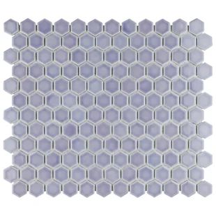 a white and purple mosaic tile with hexagonal shapes