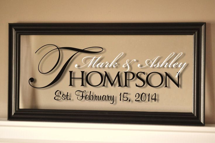 a framed sign with the name and date on it