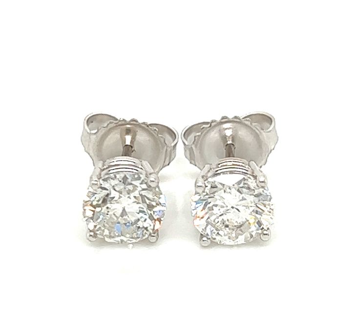 These 14K white gold stud earrings feature 1.99 TCW of brilliant cut diamonds for a timeless classic look. Their understated elegance makes them a great addition to any jewelry collection. Quality craftsmanship and diamonds of exceptional clarity provide long-lasting shine with one-of-a-kind sparkle. EG-146 White Gia Certified Diamond Earrings For Formal Occasions, Formal Diamond White Platinum Diamond Earrings, Formal Platinum Diamond White Diamond Earrings, Classic Brilliant Cut Earrings For Formal Occasions, Formal Platinum Diamond Cut Earrings, Classic Platinum Earrings For Formal Occasions, Classic Diamond Cut Diamond Earrings For Formal Occasions, Classic Brilliant Cut Diamond White Earrings, Classic Platinum Diamond Earrings With Brilliant Cut