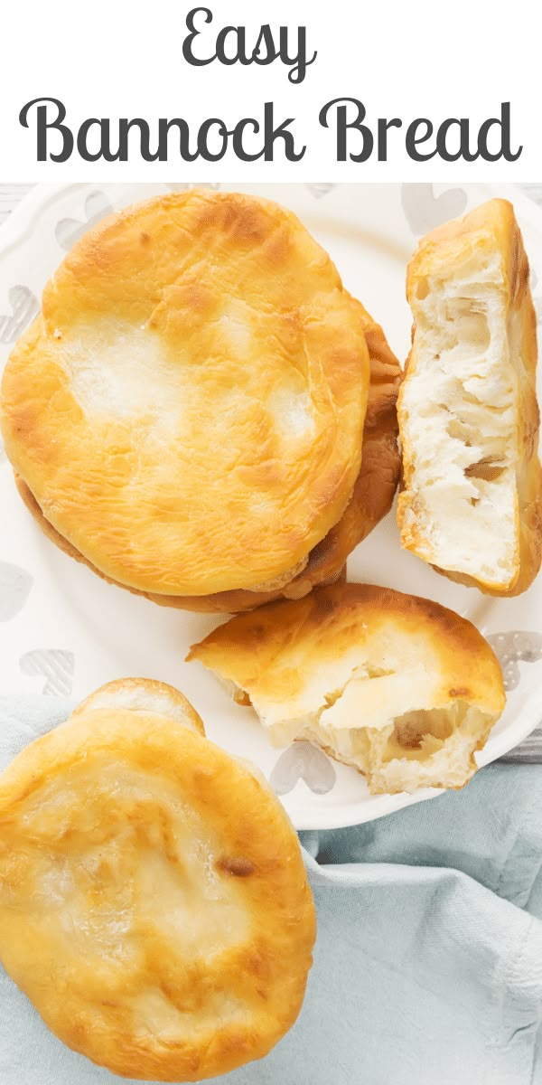 an easy bannock bread recipe on a white plate with the text overlay above it