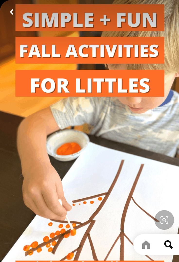 a young boy making fall activities for littles