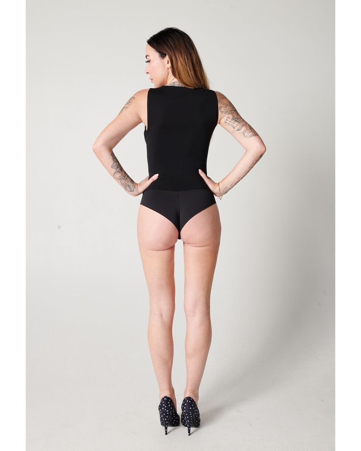 A bra-friendly bodysuit with the most flattering neckline for your double d's +! Silky soft laser-cut cheeky panty for no VPL (visible panty line) with a two-snap gusset. Buttery soft and comfy to prance around in your home but also sleek and sexy to wear out. Try under a blazer for work, pair with jeans for every day or throw on a sparkly bottom for a night out. Shapewear Bodysuit With Seamless Construction, Shapewear Bodysuit With High-cut Leg And Lined Body, Shapewear Bodysuit With High-cut Leg, Second-skin High-cut Leg Shapewear Bodysuit, High Cut High Stretch Bodysuit With Built-in Bra, Stretch Bodysuit With Built-in Bra And High-cut Leg, High-cut Shapewear Leotard With Lined Body, Seamless High-cut Leg High Stretch Bodysuit, Seamless High-cut High-stretch Bodysuit