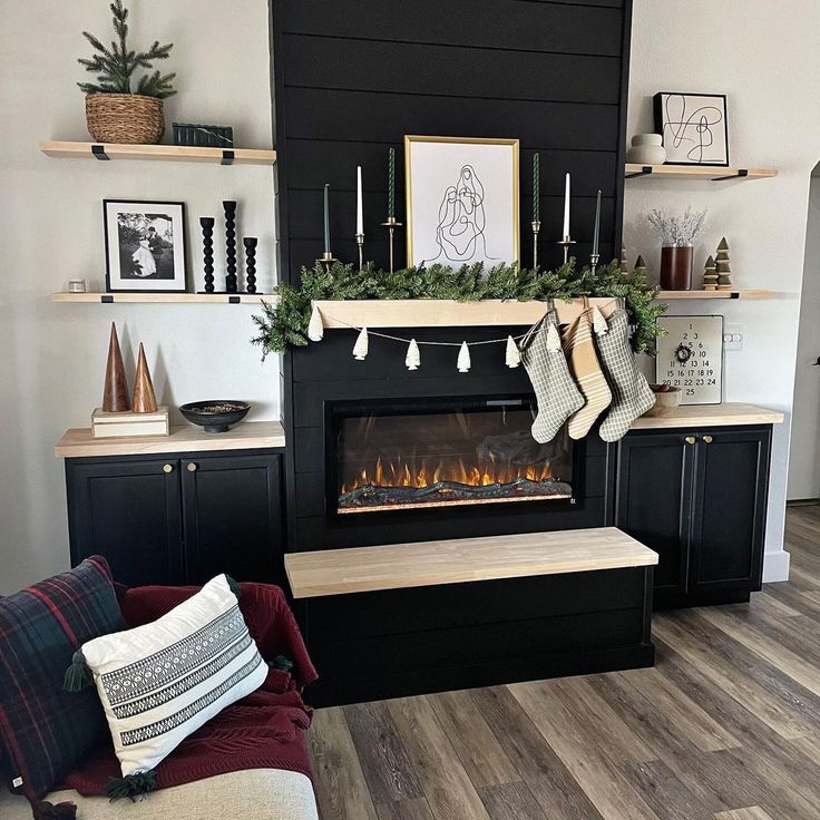 a living room filled with furniture and a fire place in the middle of the room