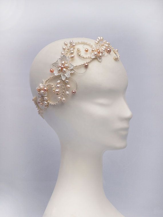 a white mannequin headpiece with pearls and beads