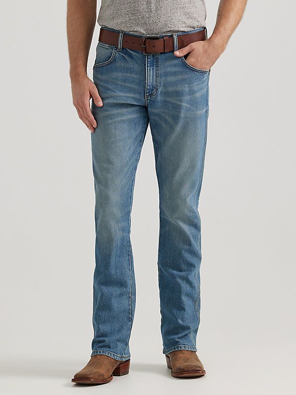 NOTHING BEATS AN ORIGINAL, BUT THIS MIGHT Since 1947, Wrangler® jeans have been a cowboy-approved wardrobe staple. Inspired by our Western heritage, these Wrangler® Retro® jeans combine our most iconic features with contemporary fits and washes. This updated classic features the same worn leather patch with our rope logo, 'W' stitching on the back pockets, and five-pocket styling. These men's slim bootcut jeans feature a streamlined silhouette through the seat, thigh, and knee, but the leg widen Medium Wash Denim Jeans For Ranch, Straight Leg Denim Jeans For Ranch, Western Style Light Wash Denim Jeans, Fitted Rugged Jeans In Medium Wash, Ranch-style Medium Wash Jeans With Five Pockets, Medium Wash Jeans For Ranch, Western Style Denim Blue Jeans For Rodeo, Fitted Straight Leg Bottoms For Western-themed Events, Medium Wash Jeans For Rodeo With Standard Cut Leg