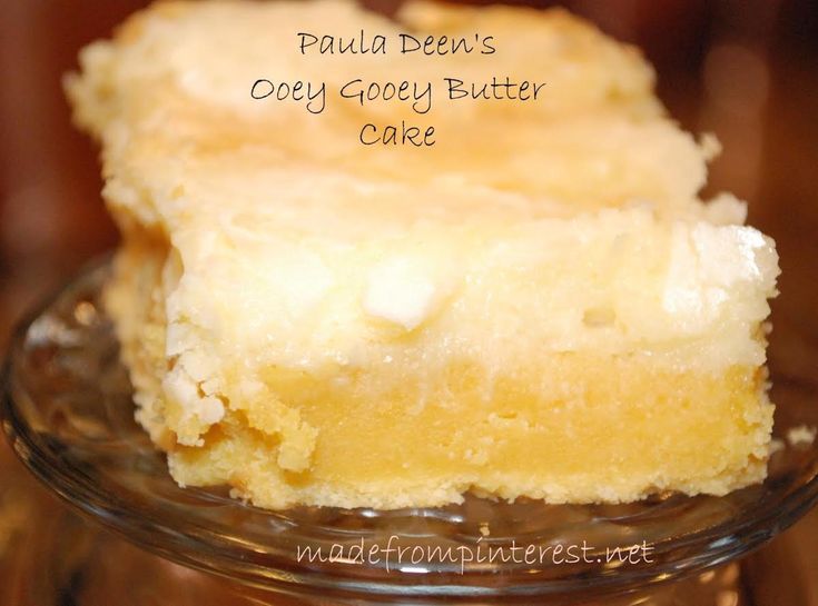 a close up of a piece of cake on a glass plate with the words, paula bean's only groozy butter cake