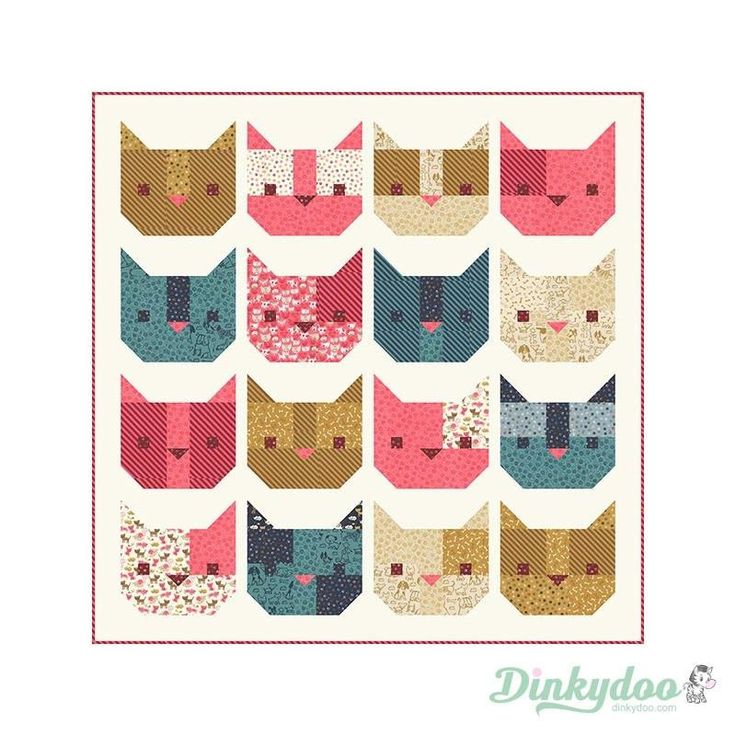 a quilt with many cats on it