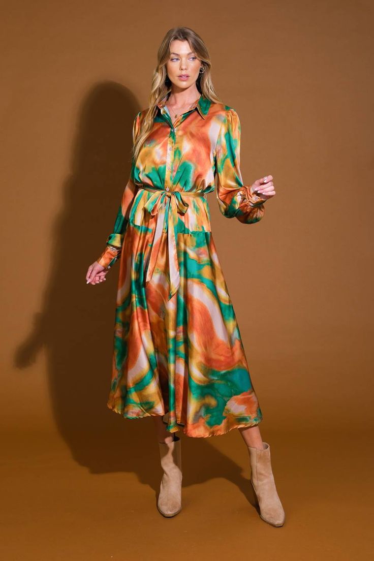 A printed woven midi dress featuring shirt collar, bodice button down, long sleeve, self sash tie and full skirt Details: Self : 97% Polyester 3% Spandex Size & Fit - Model is 5`8" And Wearing Size Small- Measurements Taken From Size Small- Approx. Length: 49" Green Long Sleeve Shirt Dress For Fall, Belted Multicolor Dresses For Fall, Collared Midi Dress For Fall Brunch, Chic Multicolor Belted Midi Dress, Fall Long Sleeve Shirt Dress With Tie Waist, Fall Collared Shirt Dress With Tie Waist, Spring Collared Midi Dress With Tie Waist, Brunch Shirt Dress With Tie Waist, Midi Length, Green Collared Shirt Dress For Fall