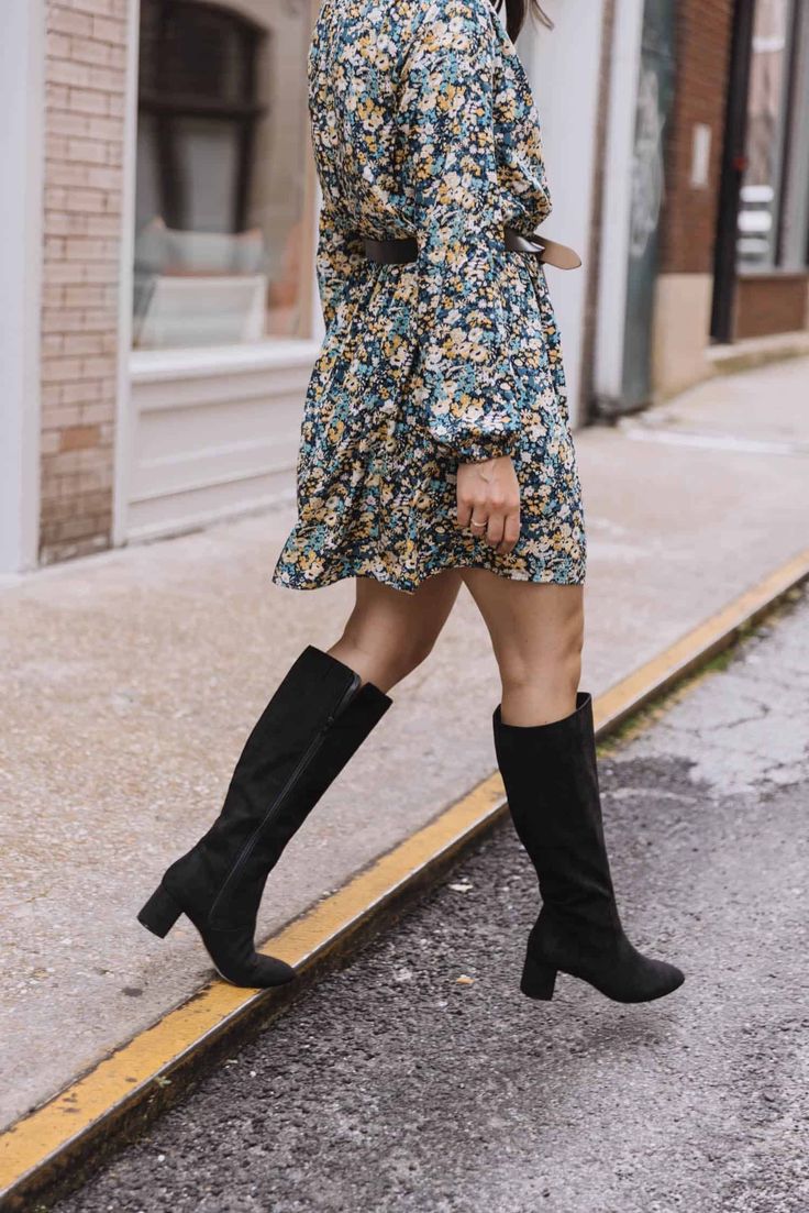 Get ready to strut in style this Fall 2023 with the chicest knee-high boots 👢🍁. Find the perfect pair to complement your cozy autumn outfits. So, buckle up for a fashionable season! 🍂🌟 - black block heel knee high boots with a floral printed mini dress Black Calf Boots Outfit, Summer Dress For Fall, Calf Boots Outfit, Tall Boots Outfit, Black Knee Boots, Knee Boots Outfit, Knee High Boots Flat, Boots For Fall, Dress For Fall