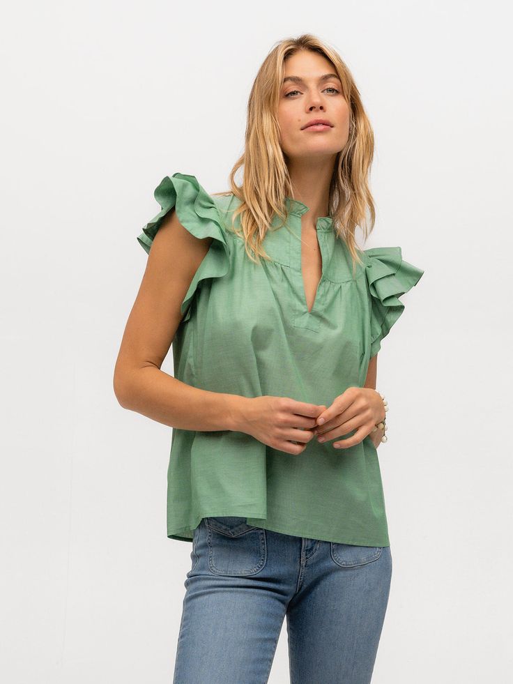 GREEN SOLID Our playful Flutter Sleeve top perfect for warmer weather in vibrant green cotton voile. Green Relaxed Fit V-neck Top, Green Relaxed Fit V-neck Blouse, Casual Green Summer Blouse, Casual Cotton Flutter Sleeve Tops, Casual Green Tops For Summer, Casual Cotton Tops With Flutter Sleeves, Green V-neck Top With Ruffles, Green Summer Blouse With Relaxed Fit, Spring Cotton Blouse With Flutter Sleeves