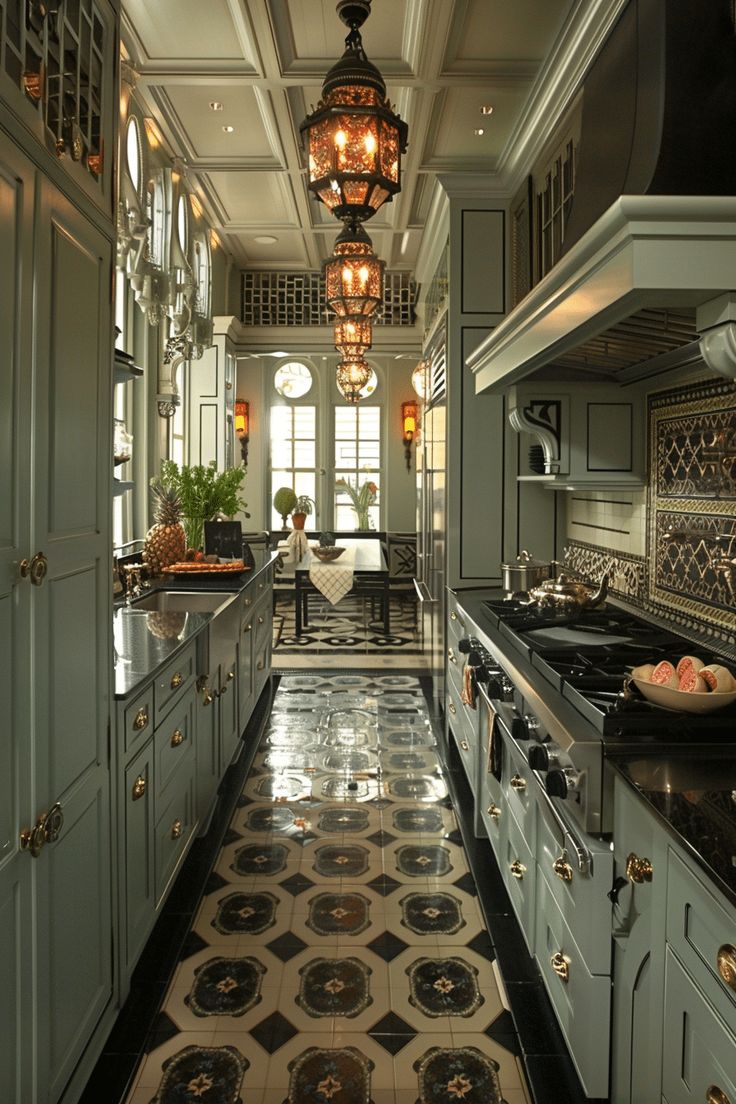 a kitchen with an ornate tile floor and chandelier