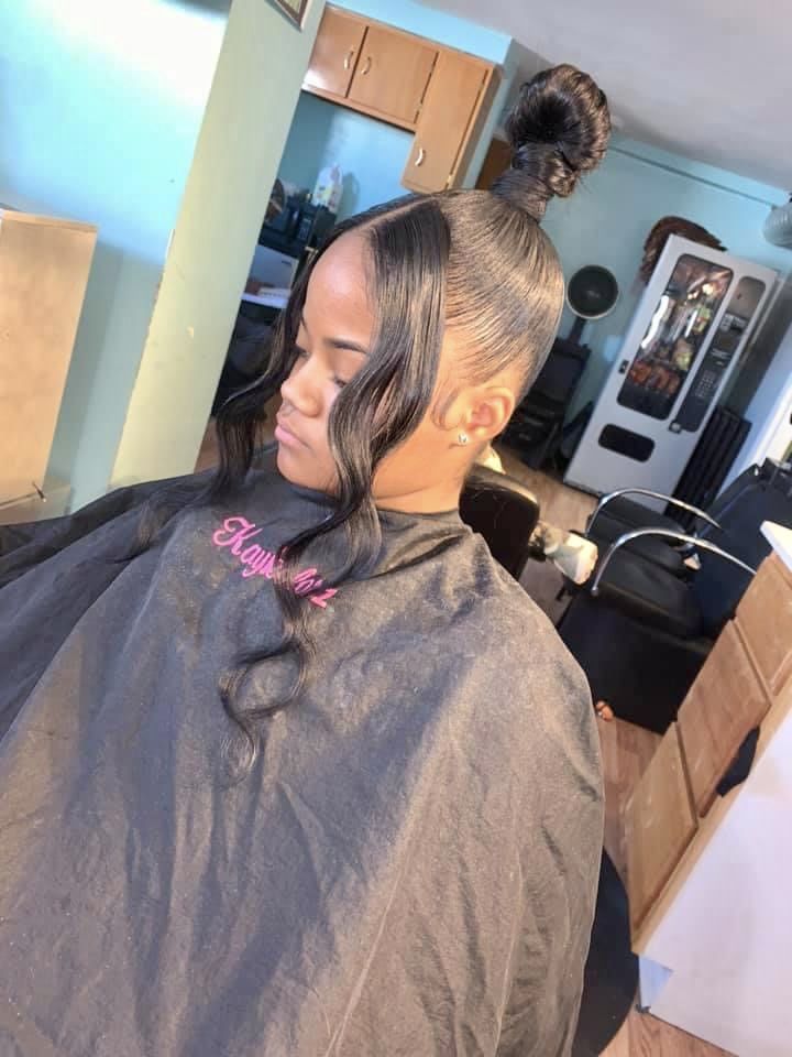 Side Part Hairstyles For Black Women Bun, Knotted Ponytail Black Hair, Curly Top Knot Bun With Weave, Bushy Ponytail Hairstyles Black, Top Knot Bun With Bangs, Bushy Ponytail Black Women, 2000s Ponytail Black Women, Cute Weave Hairstyles, Sew In Hair Extensions