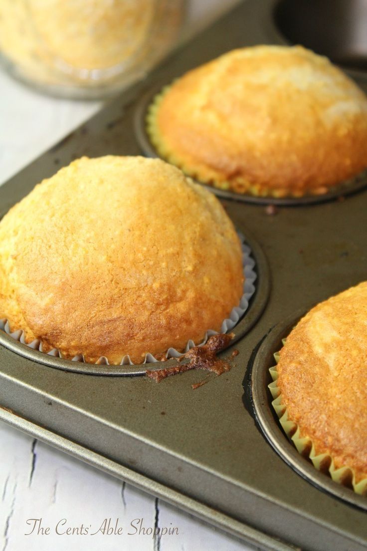 three muffins sitting in a pan on top of a table