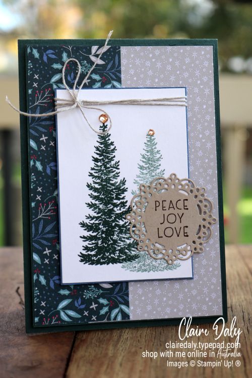 a handmade christmas card on a wooden table